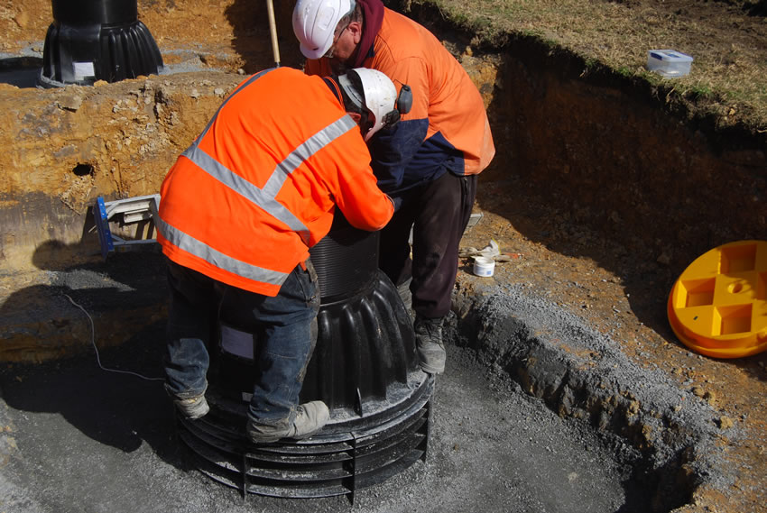 Plastic Manhole Chamber Installation - Pressing Down Cone