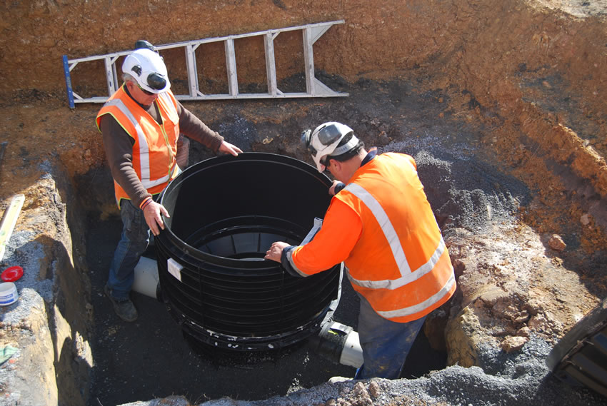 Plastic Manhole Chamber Installation - Aligning Riser